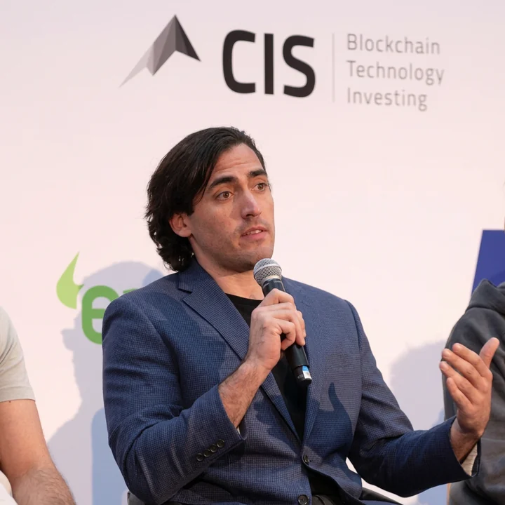 Kyle White speaking on a panel at the Crypto Invest Summit